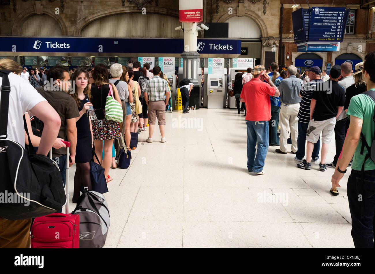 Long queues for Train tickets at London's Victoria Station Stock Photo