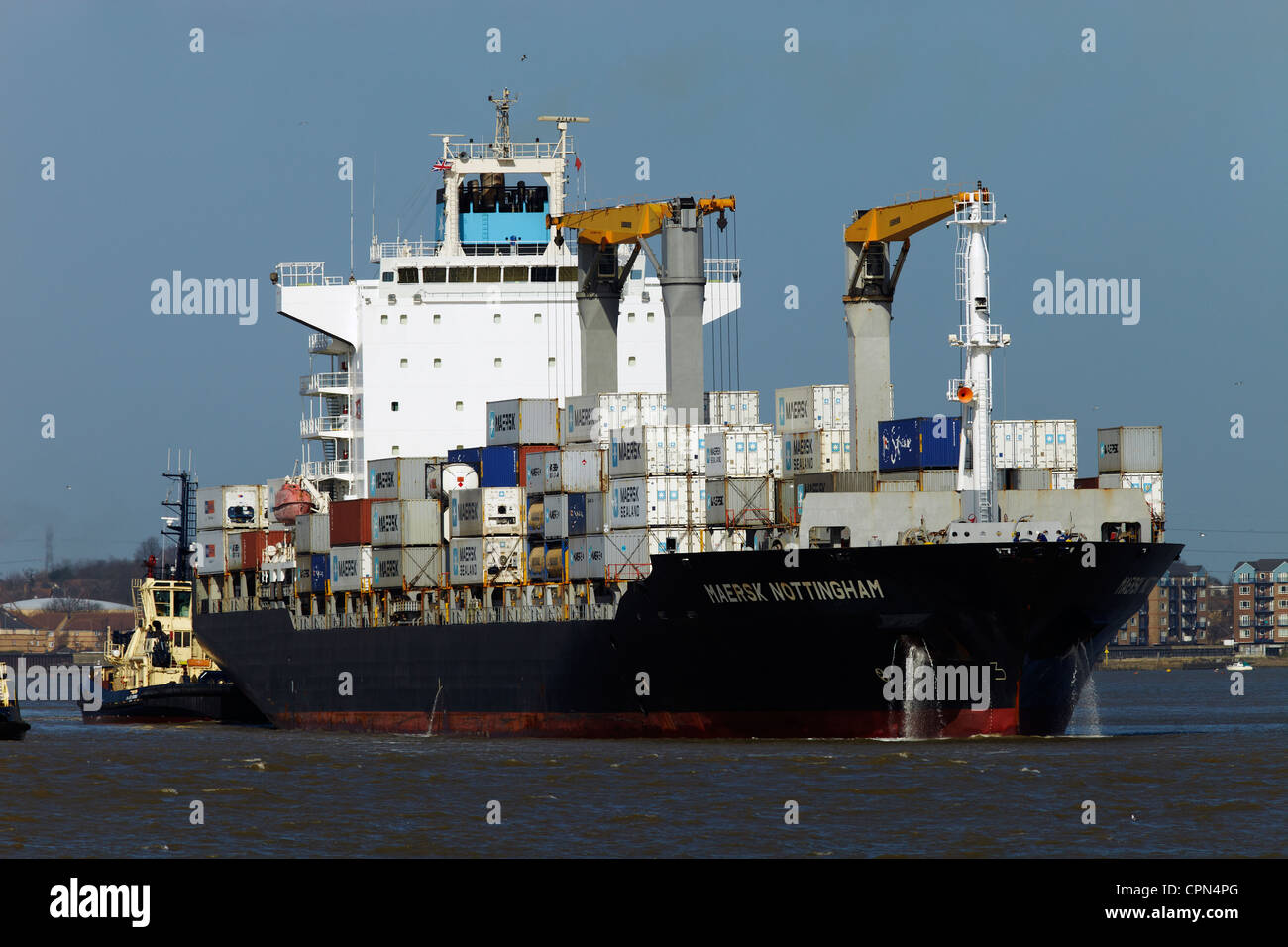 The container ship "Maersk Nottingham" leaving Tilbury docks, the river