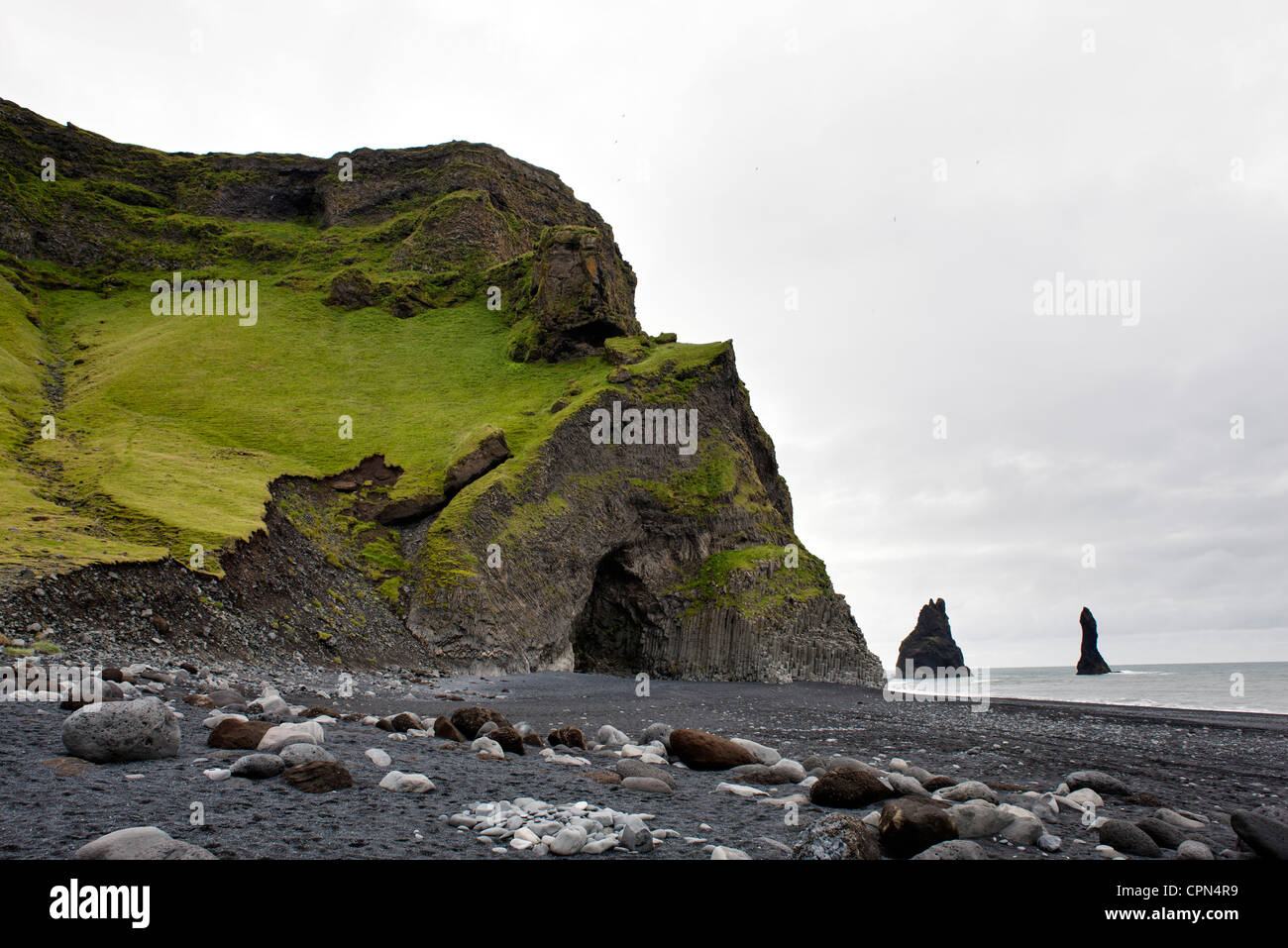 Columnar basalt cave and black sand, Vik Beach, Vik, Iceland Stock Photo
