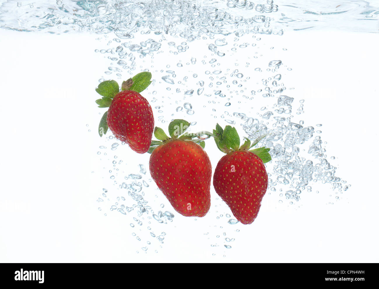 strawberries-submerged-in-water-stock-photo-alamy