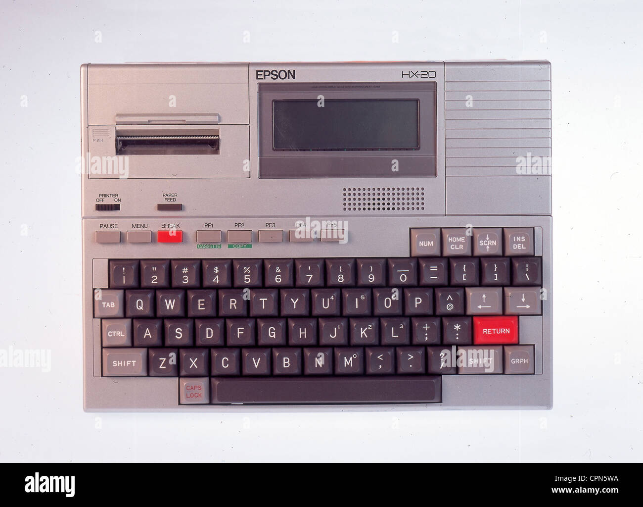 computing / electronics,computer,first laptop of the world Epson HX-20,made by Seiko Epson Corp.,with integrated LCD display,four lines with 20 letters,Made in Japan,1982,printer with 5 centimeter wide paper from the roll,16 kilobyte(maximal 32 KB)working memory,integrated accumulator,interface RS-232C,weight: 1.6 kilo,dimension DIN A4,first hand-held,original price in Germany 1982: 1798 Mark,Liquid Crystal Display,liquid crystal display,integrated dot-matrix printer,typewriter keyboard,EDP,IT,display,keyboard,keyboards,laptop,laptop,Additional-Rights-Clearences-Not Available Stock Photo