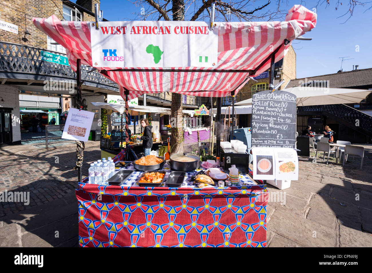 London Camden Town Lock Market Stables The Taste of West Africa stall fast food snack kiosk cuisine rice beans chicken Stock Photo