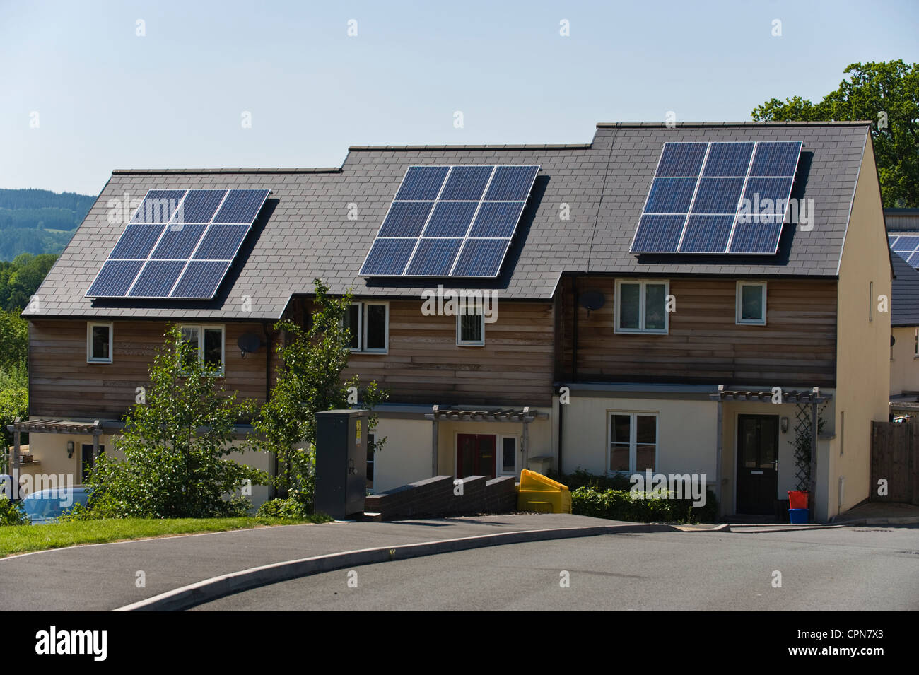 Solar panels on roof of houses in a rural housing development in Crickhowell South Wales UK Stock Photo