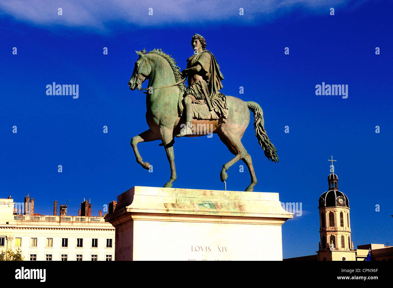 In the centre of Place Bellecour(Lyon,France) stands an equestrian statue of King Louis XIV, to the afternoon Stock Photo
