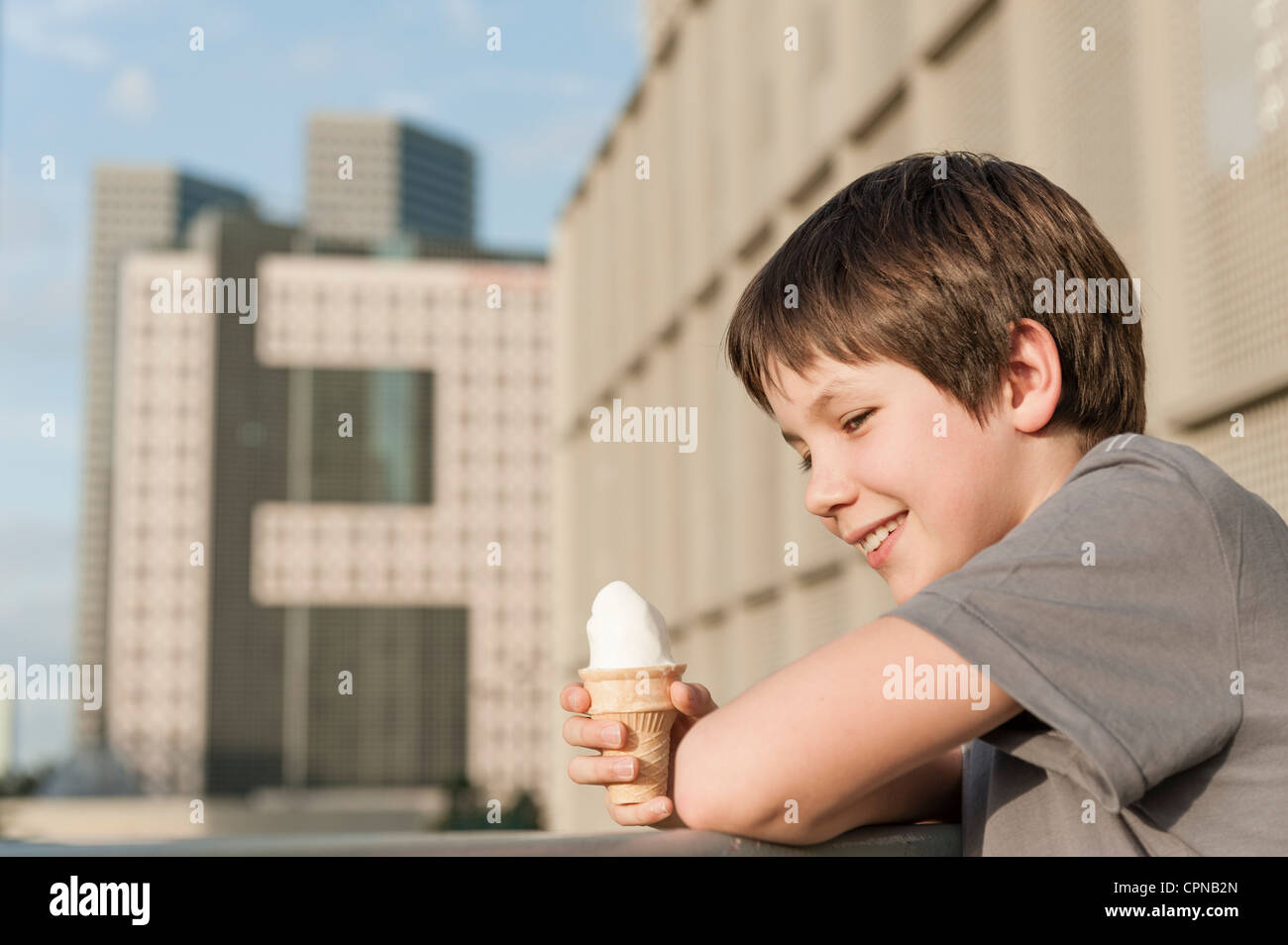 Boy holding ice cream cone, portrait Stock Photo
