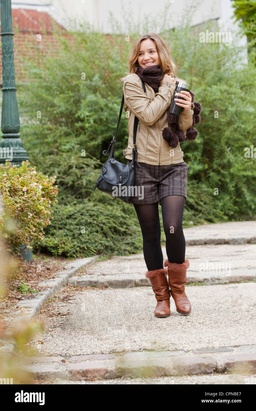 Old woman walks cup hi-res stock photography and images - Alamy