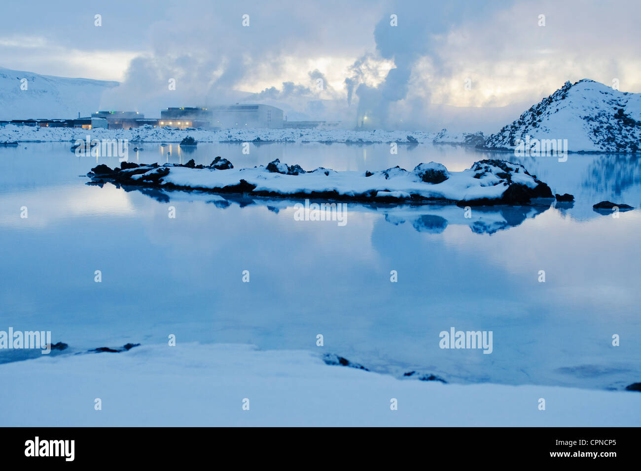 Iceland, Reykjanes Peninsula, Blue Lagoon geothermal spa, geothermal power plant in background Stock Photo