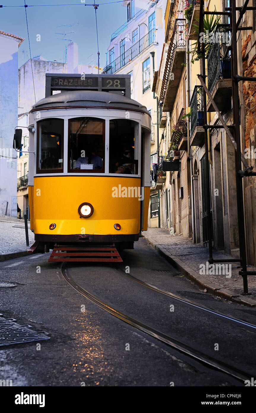 Vintage Trams such as these two are a common site in the Portuguese Capital of Lisbon - Portugal Stock Photo