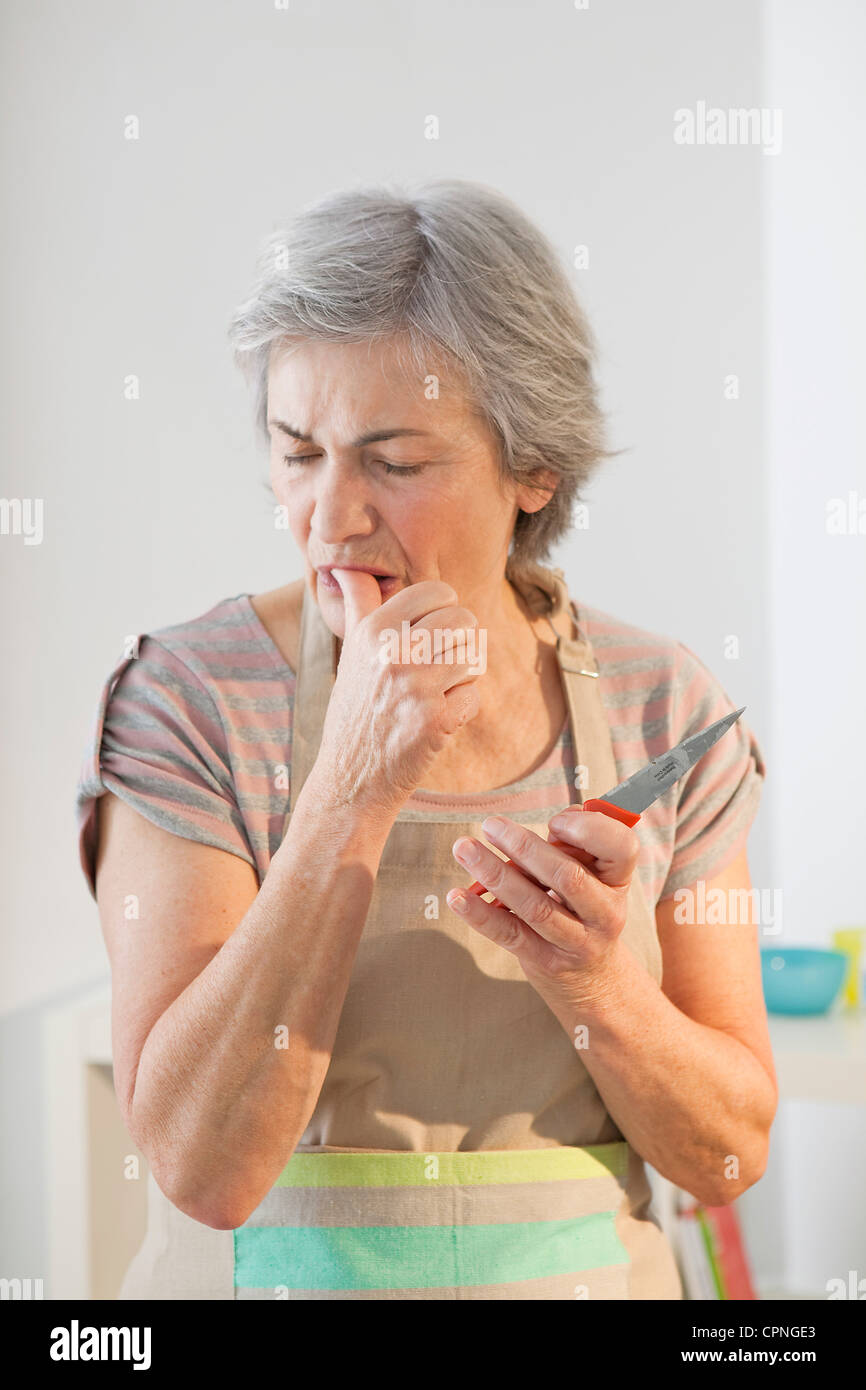 ELDERLY PERSON IN KITCHEN Stock Photo Alamy