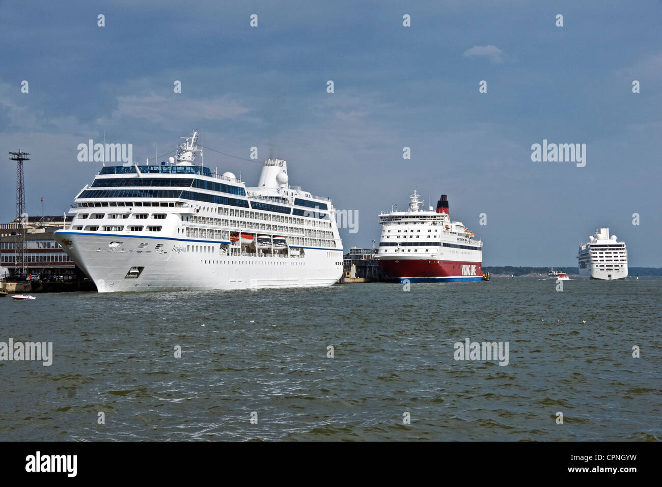 Cruise ships Insignia (l) & Azamara Journey (r) frames Viking Line Gabriella in Helsinki Harbour Finland Stock Photo