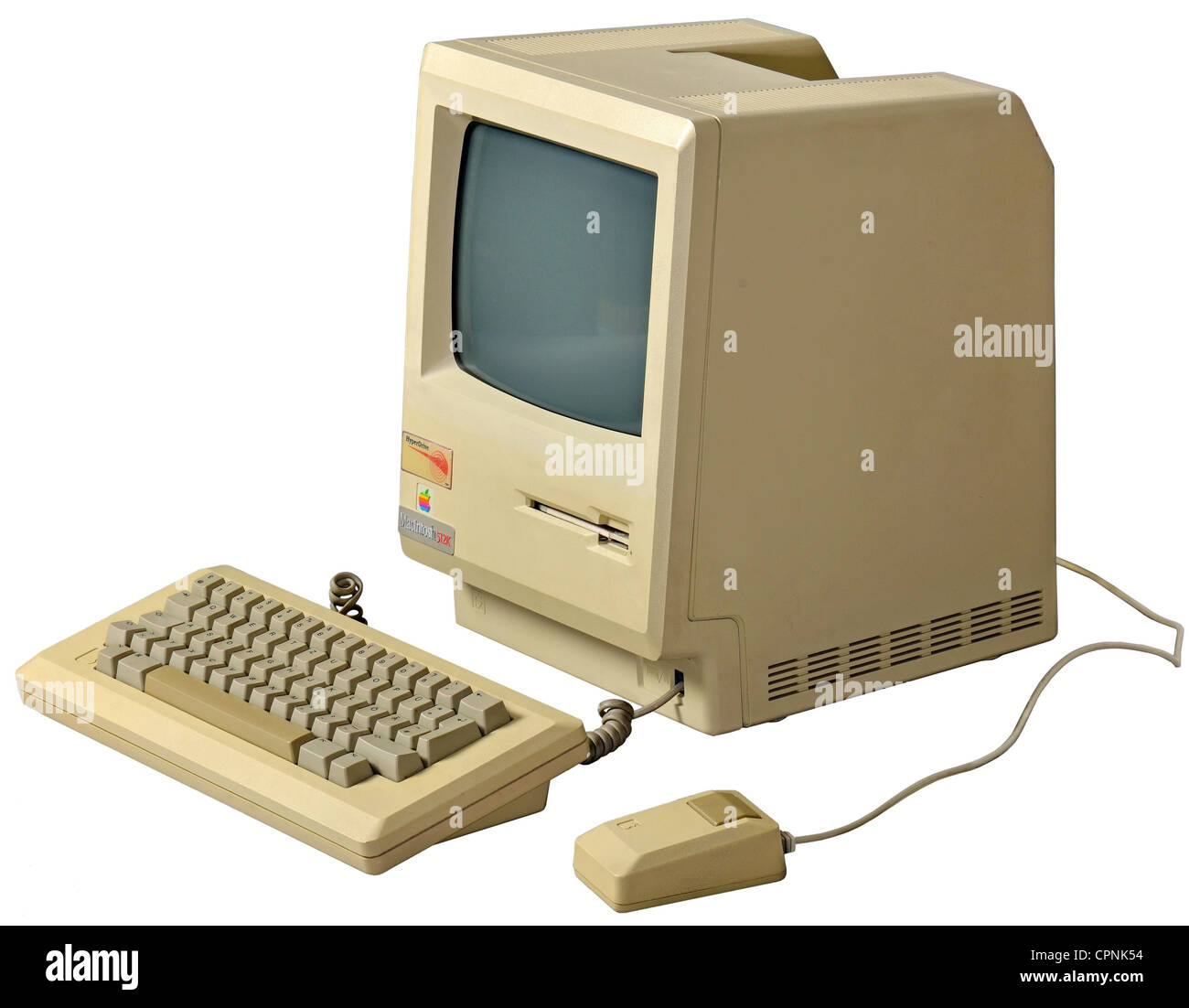 computing / electronics,computer,Apple Macintosh 512k,with integrated 9-Zoll-s/w-Monitor and 3.5-inch Flopyy Disc Drive,keyboard,mouse,computer mouse,Apple Mouse,512 KB RAM,processor: Motorola 68000,8 MHz,extra built-in hard disk drive HyperDrive,the at that time first internal hard disk drive for the first Apple Macintosh,original price 1984: 3.195 dollar,made by: Apple Computer Inc.,Cupertino,California,USA,1984,design classics,nickname,nicknames,nicknaming,Apple Mac,Mac cube,Made in USA,personal computer,history of computer,comput,Additional-Rights-Clearences-Not Available Stock Photo