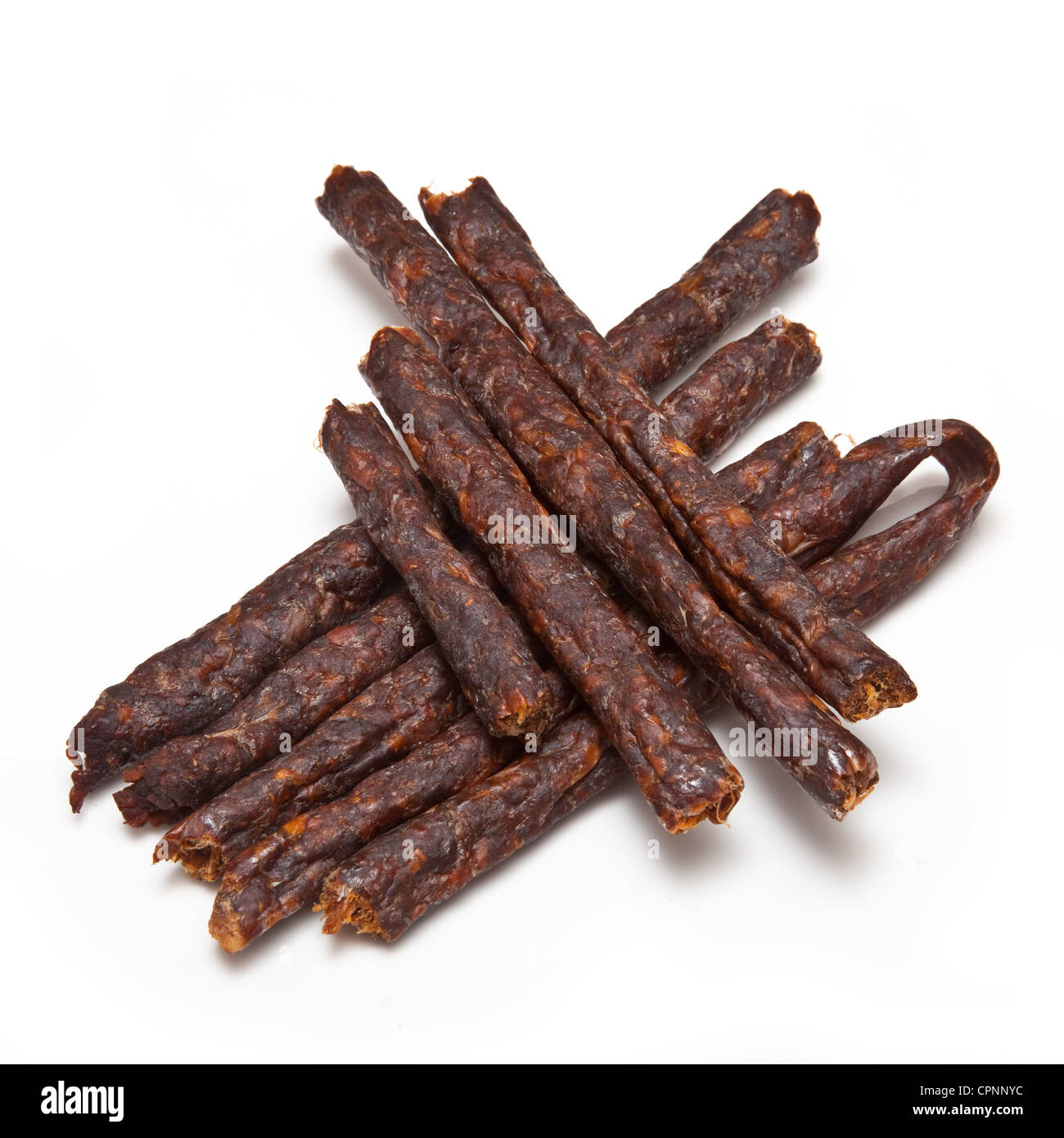 South African spicy Peri peri drywors (dried sausage jerky) isolated on