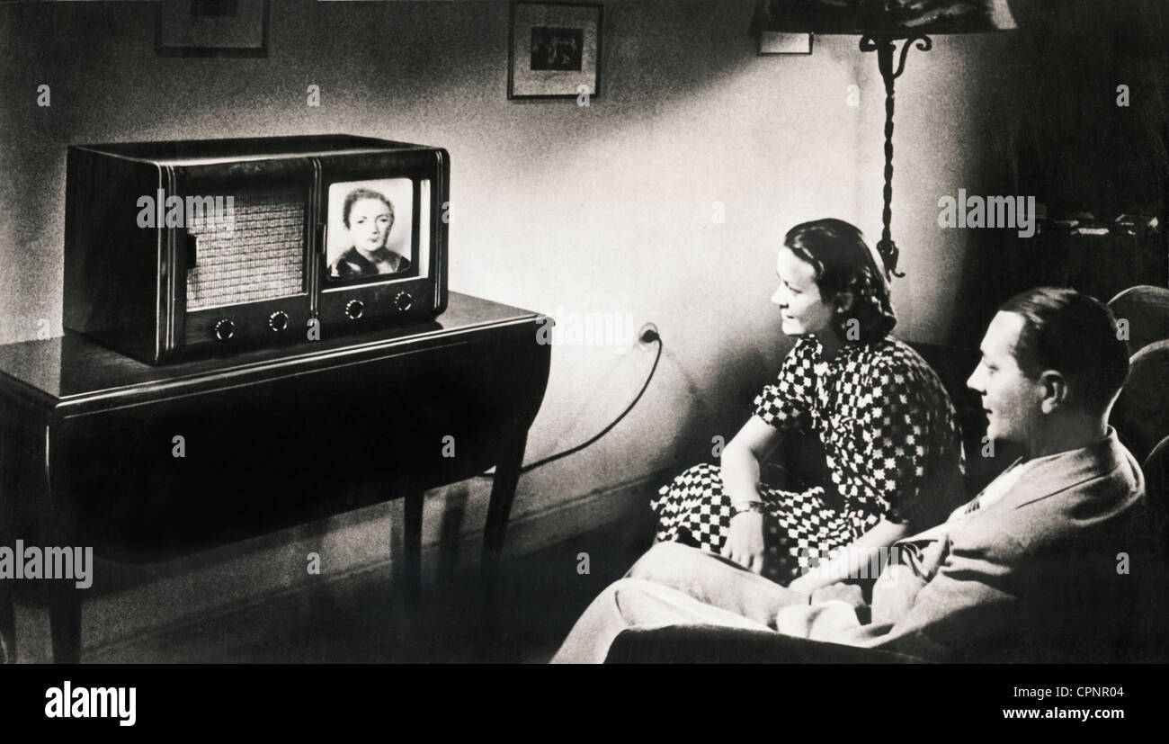 broadcast, television, viewers in front of television set Stock Photo