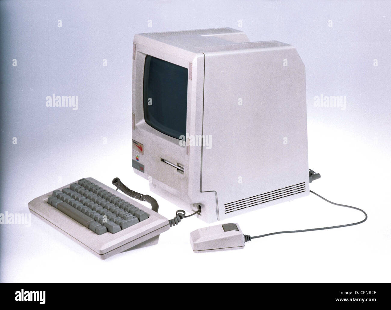 computing / electronics,computer,Apple Macintosh 512k,with integrated 9 inch bw-monitor and 3.5 inch floppy disk drive,USA,1984,keyboard,keyboards,computer mouse,clicker,mice,mouses,512 kilobyte random access memory,processor Motorola 68000,8 megahertz,original price 1984: 3.195 dollar,design,classic,nickname: Apple Mac,cubes,Mac cube,personal computer,history of computer,computer engineering,invention,inventions,80s,W. M. Weber Collection,EDP,IT,still,studio shot,hardware,consumer electronics,home computer,compact unit,compa,Additional-Rights-Clearences-Not Available Stock Photo