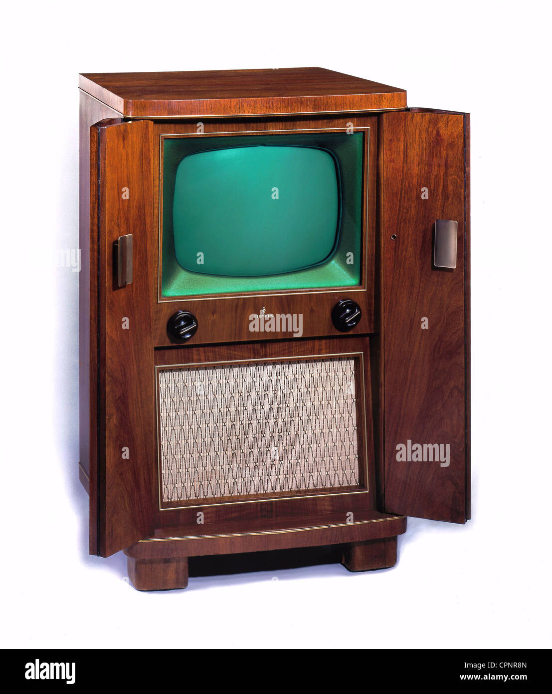 broadcast, television, television sets, standalone device Siemens Type S 543 a, walnut cabinet on rolls in casket form with closeable folding blinds, the power button is activated by opening respectively closing the doors, television set is therewith childproof, screen size: 43 centimeter diagonal, early German postwar television set, Germany, 1954, Additional-Rights-Clearences-Not Available Stock Photo