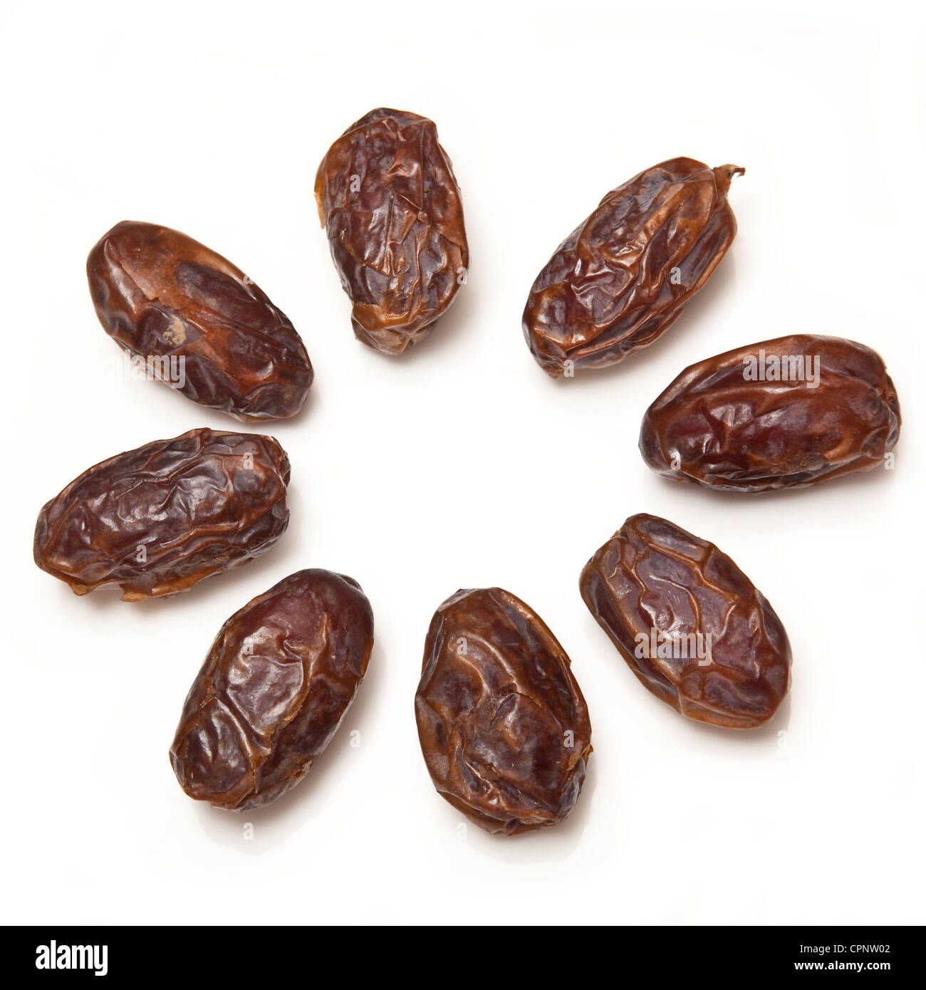 Dried Medjool dates isolated on a white studio background Stock Photo