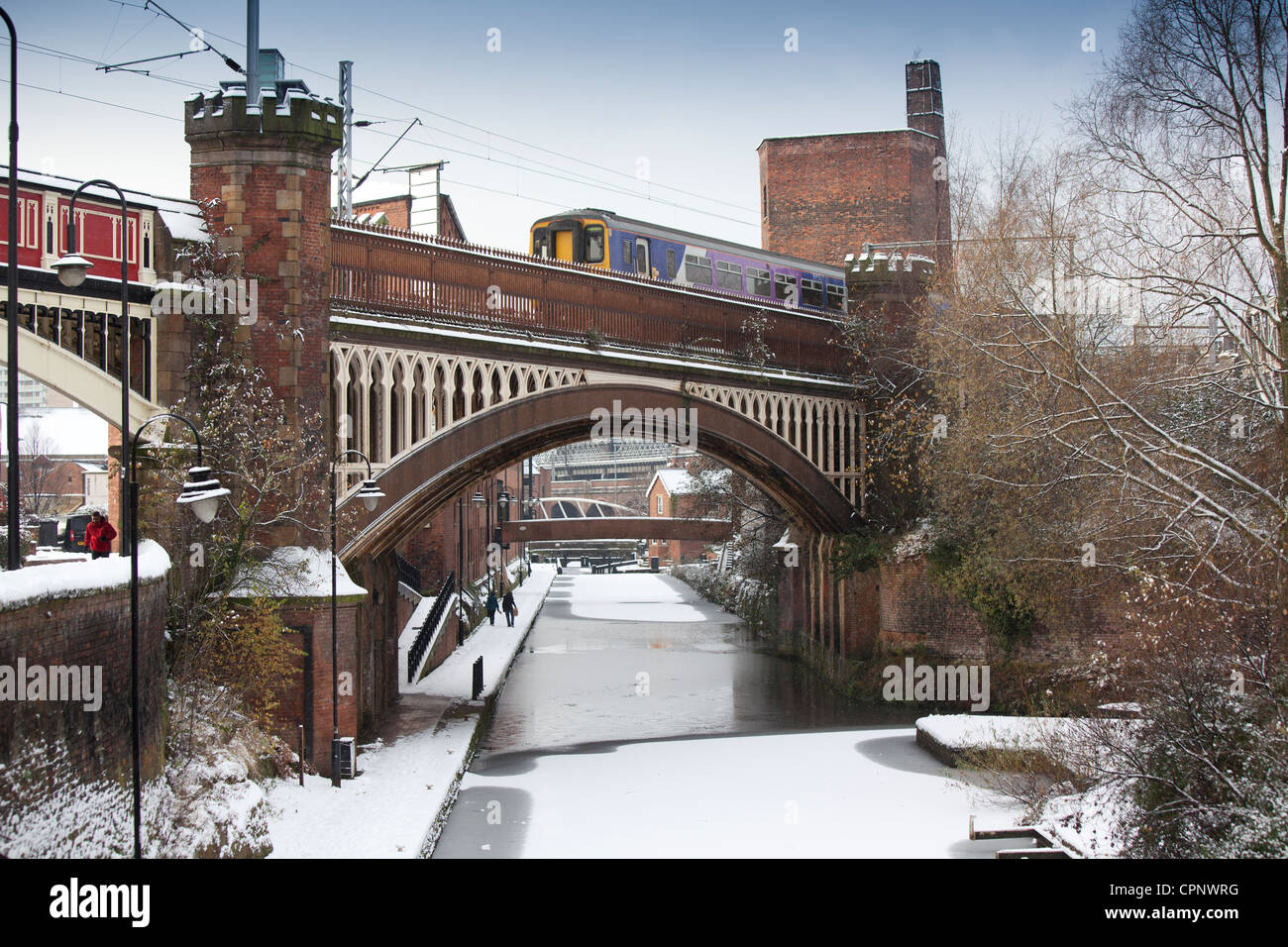 Snow covered Rochdale Canal looking towards 92Duke's Lock, from Deansgate Manchester in the Castlefield area Stock Photo