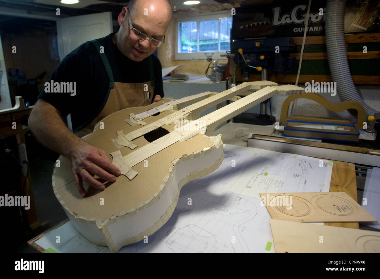 St. Thomas Ontario, Canada. John LaCroix of Lacroix Guitars custom builds guitars that sell between $3000 to $10,000. Stock Photo
