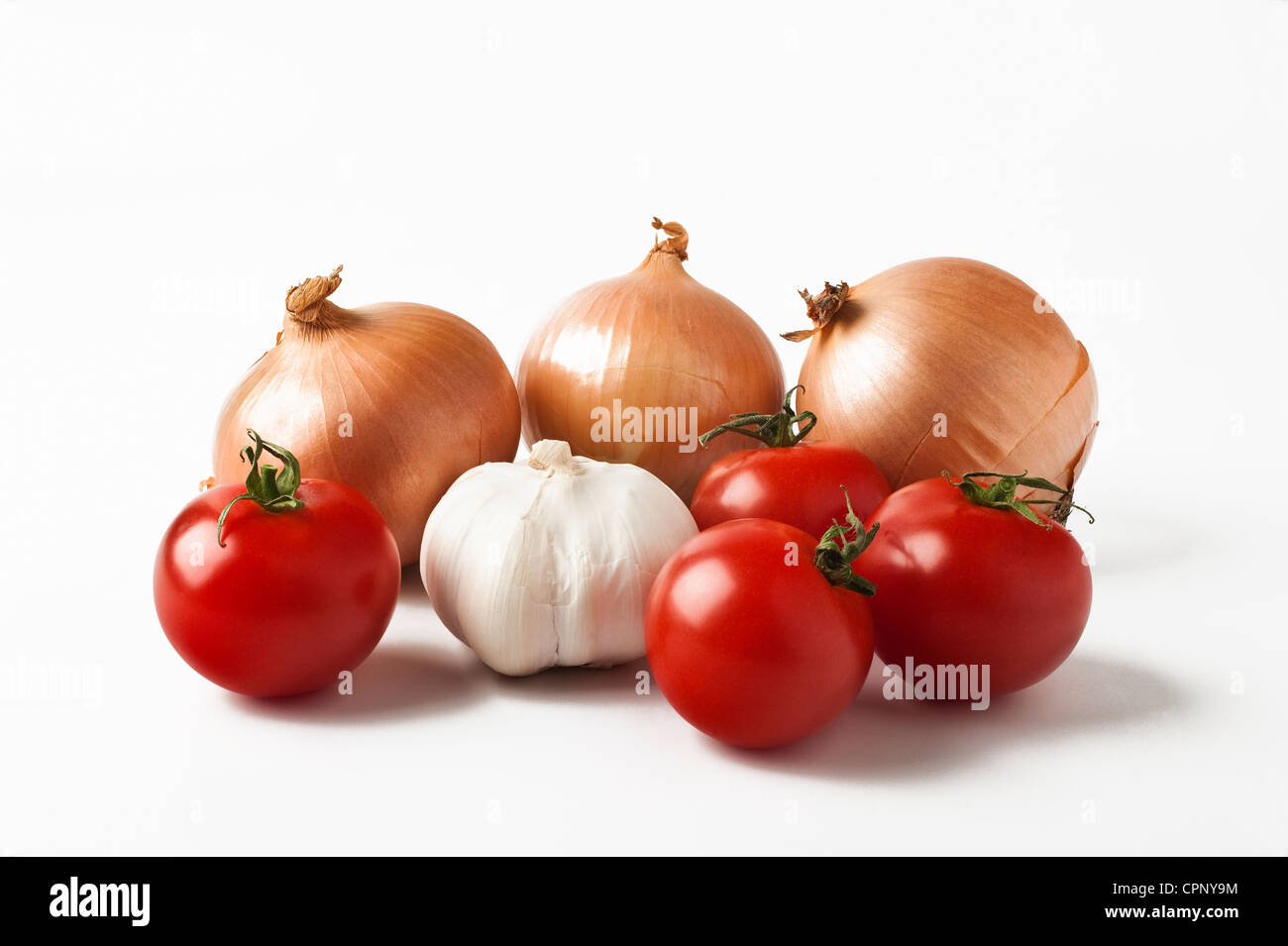 The most important ingredients in any Mediterranean recipe - tomatoes, onions and garlic Stock Photo