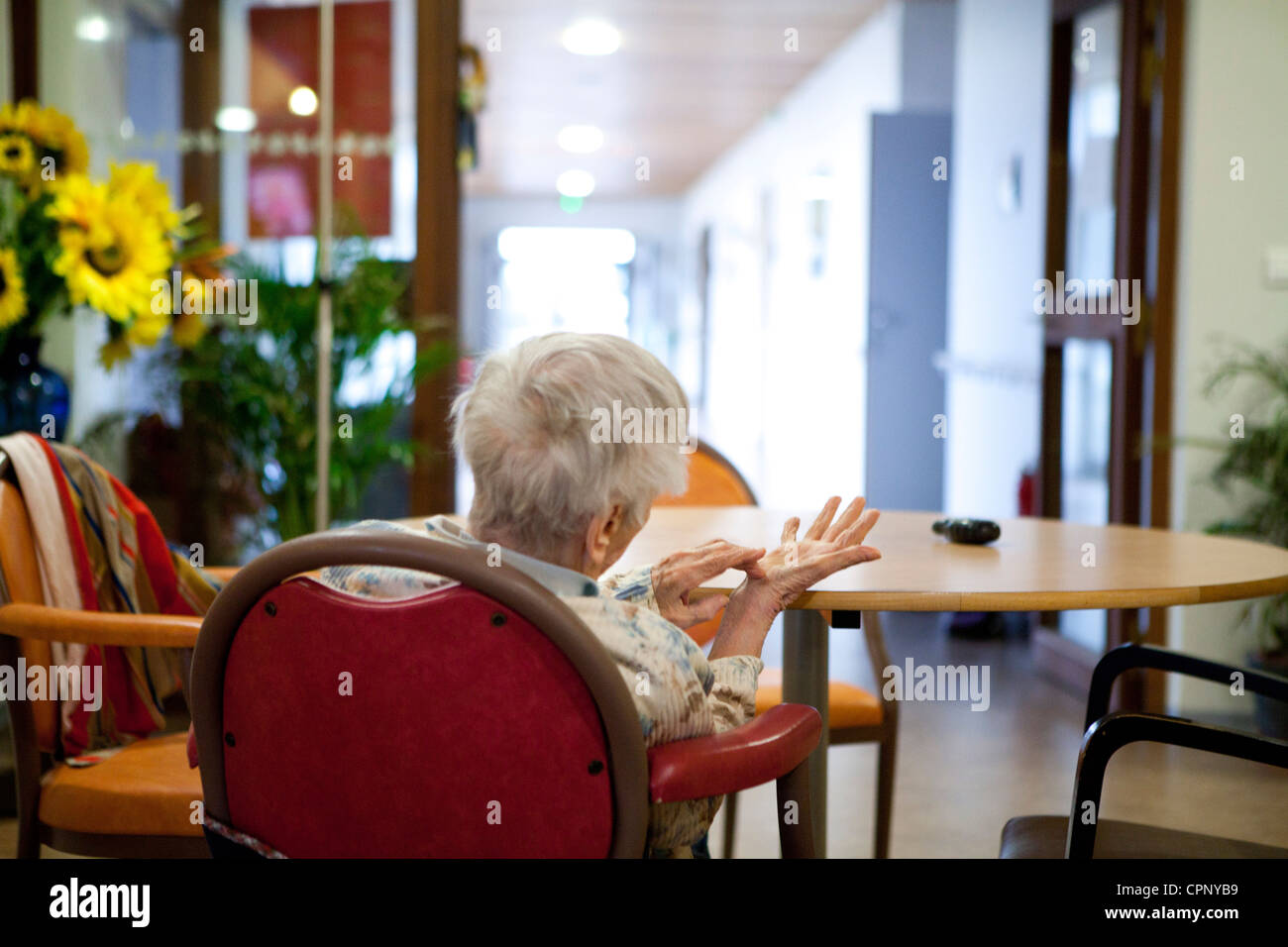 Senior inside home back view hi-res stock photography and images - Alamy