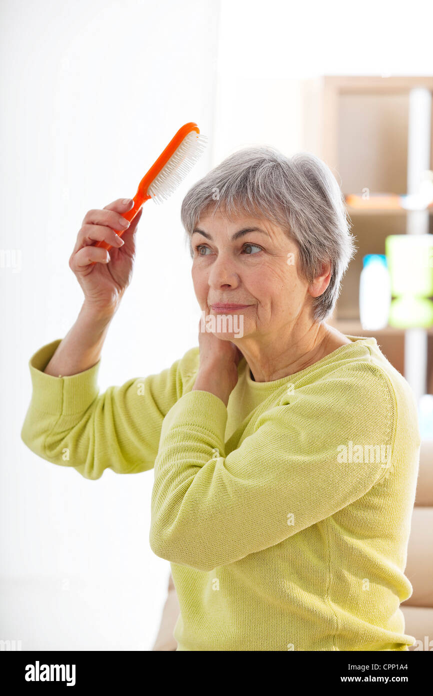 HAIR CARE, ELDERLY PERSON Stock Photo Alamy