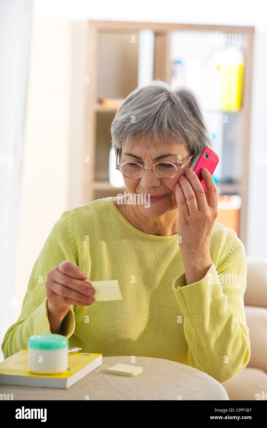 ELDERLY PERSON ON THE PHONE Stock Photo Alamy