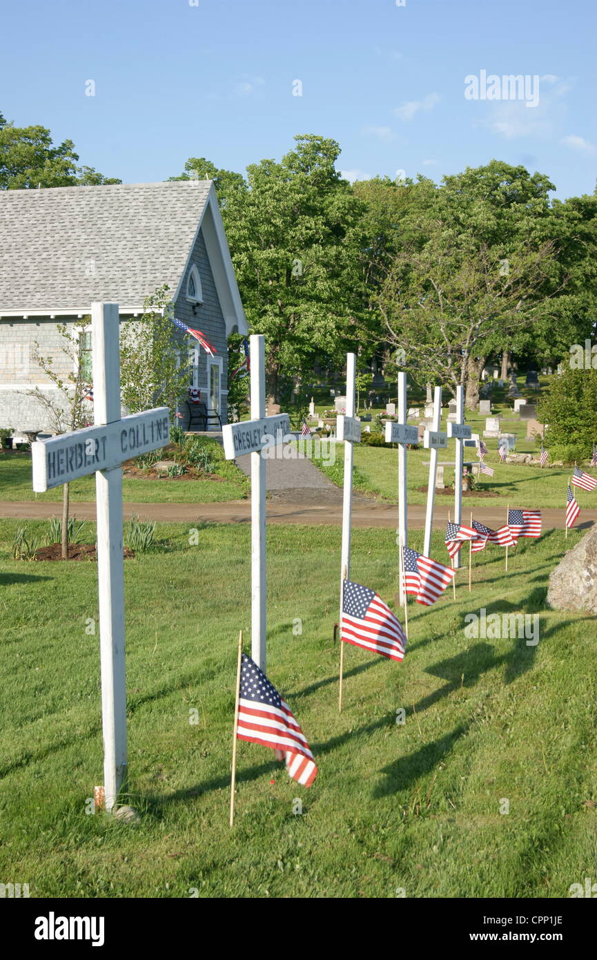 World War I memorial at Grove Cemetery decorated with American Flags on May 28, 2012, Memorial Day, Belfast, Maine, USA. Memorial Day is a national holiday honoring fallen soldiers. Stock Photo