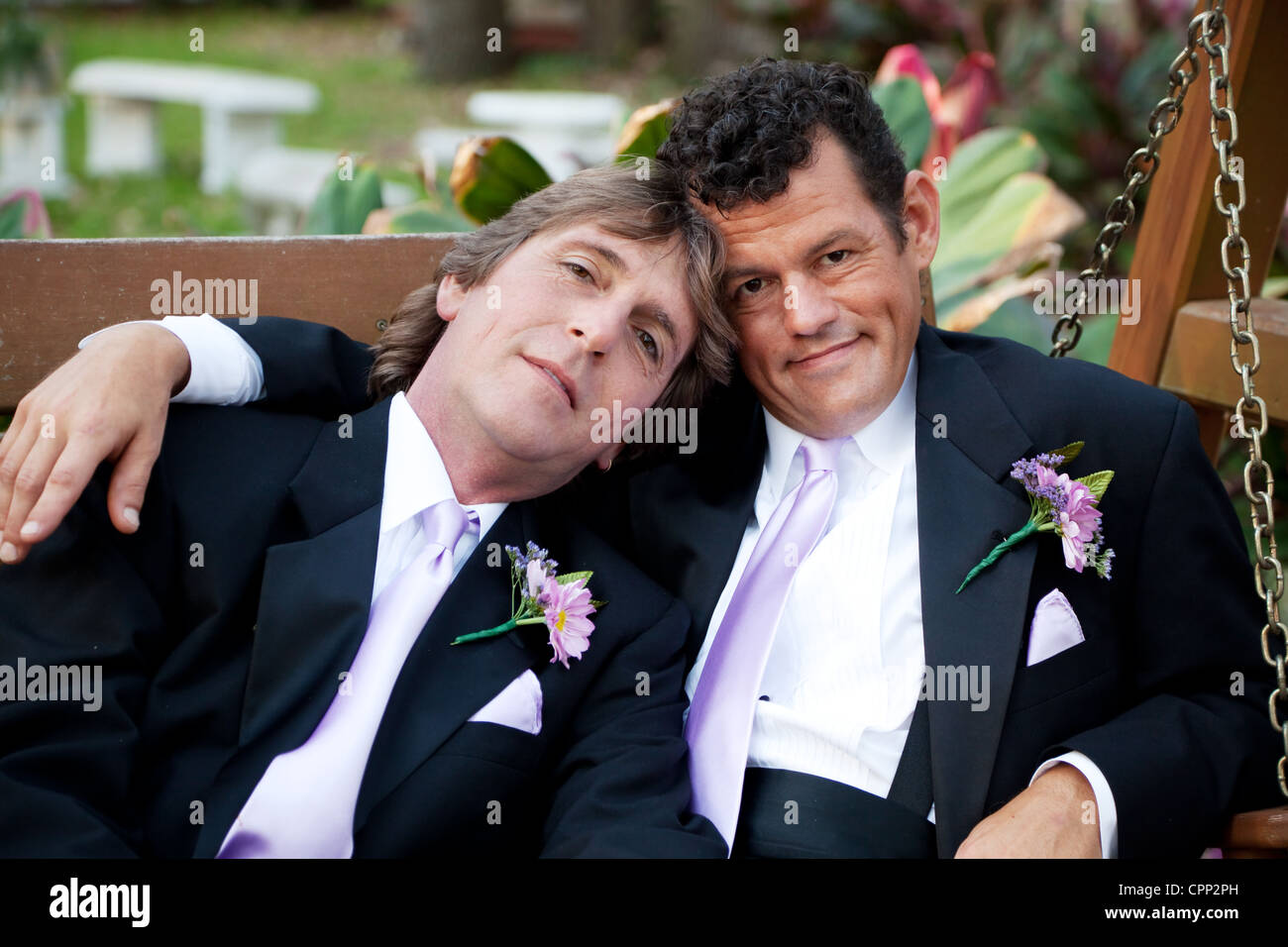 Portrait of very handsome gay male couple on their wedding day.  Stock Photo