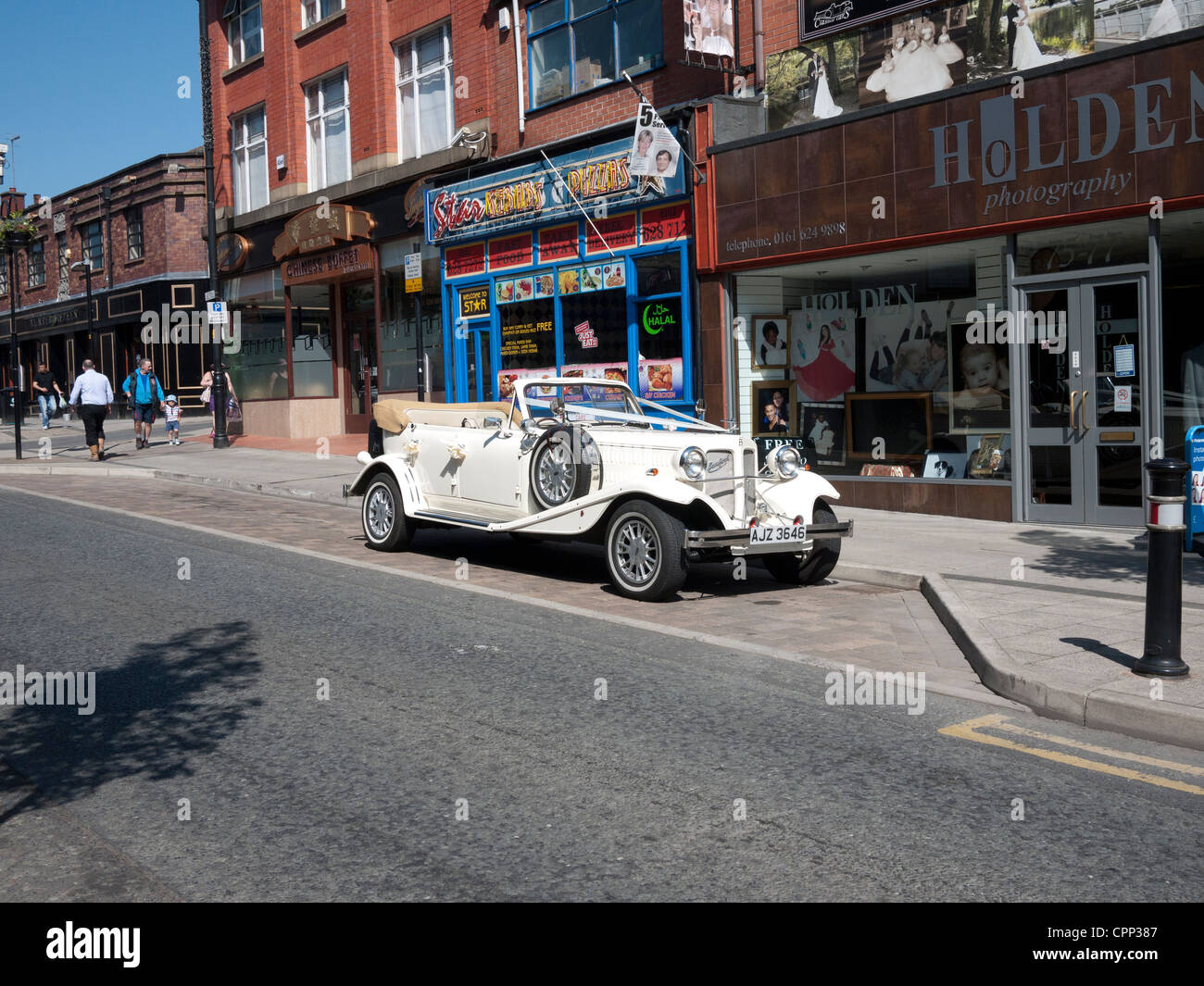 Wedding Car outside Photographers Shop, Oldham, Greater Manchester, UK