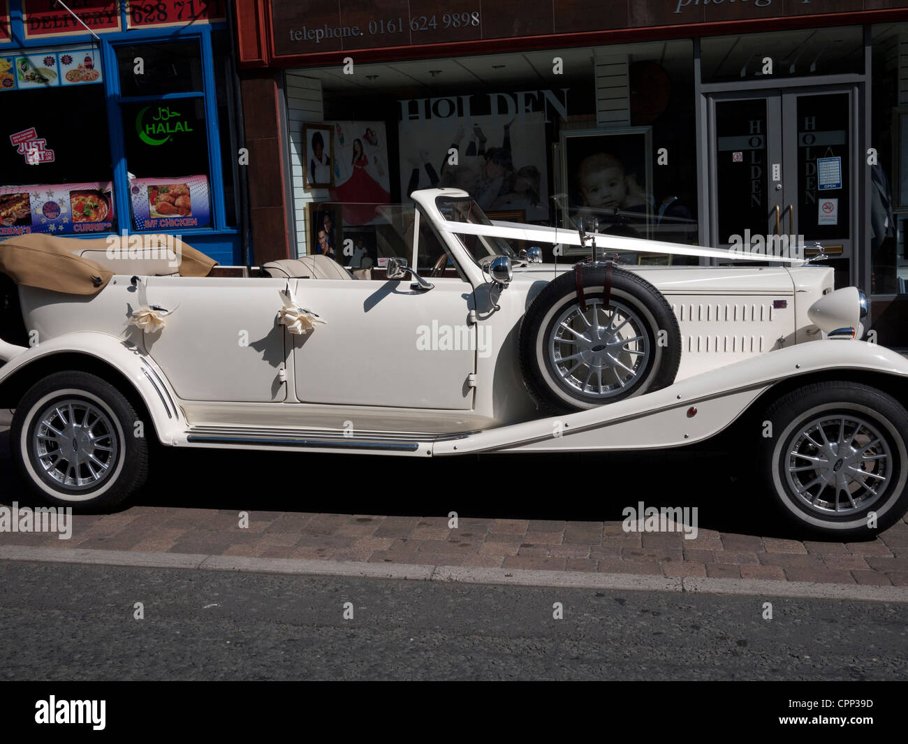 Wedding Car outside Photographers Shop, Oldham, Greater Manchester, UK