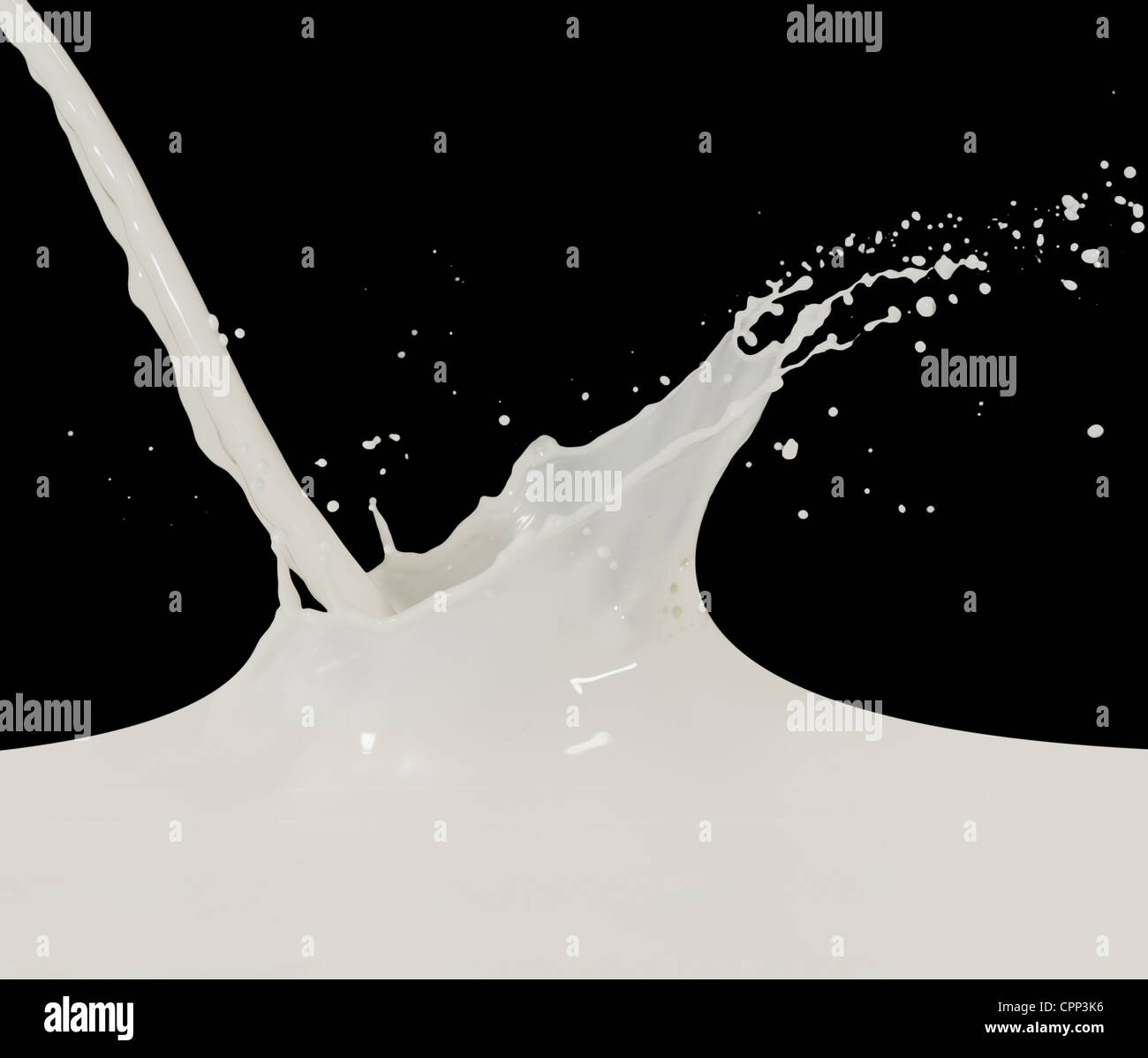 splashing milk isolated on black background Stock Photo - Alamy