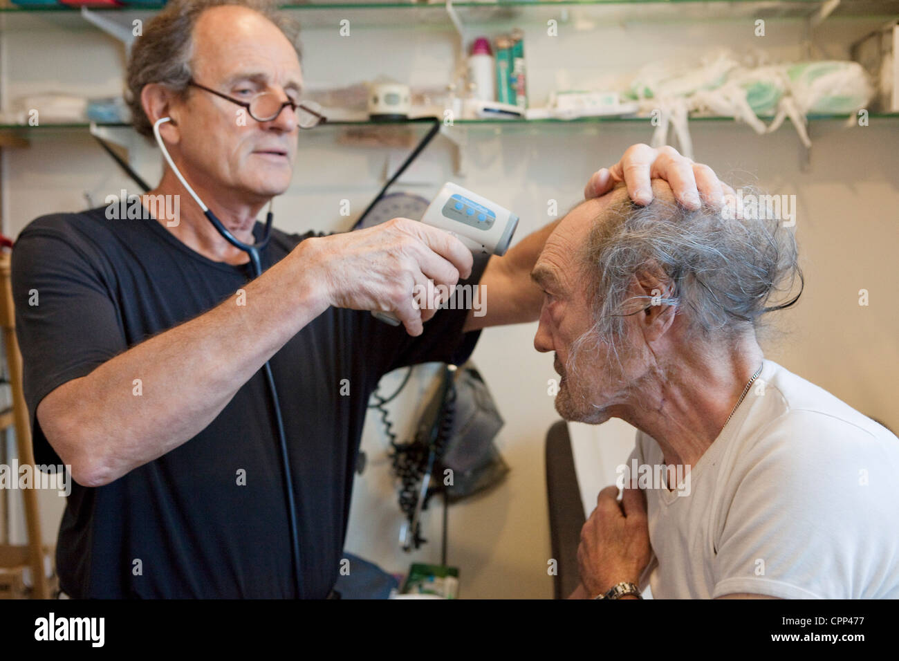 TEMPERATURE ELDERLY PERSON Stock Photo Alamy