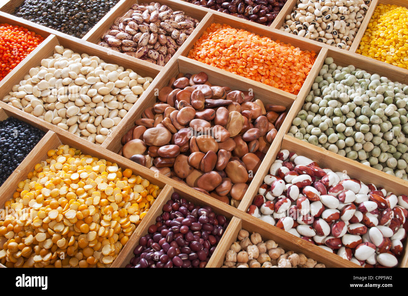 peas, beans and lentils in the wooden box Stock Photo