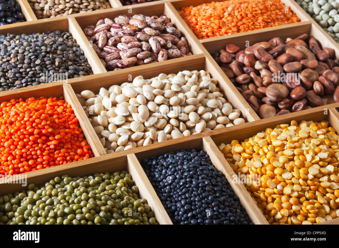 peas, beans and lentils in the wooden box Stock Photo Alamy