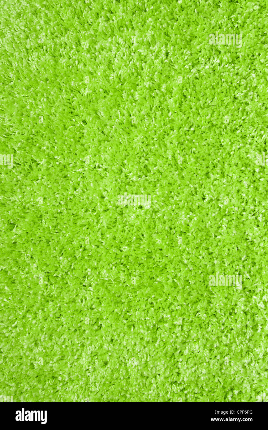 green carpet of artificial material close-up. The texture of the carpet Stock Photo