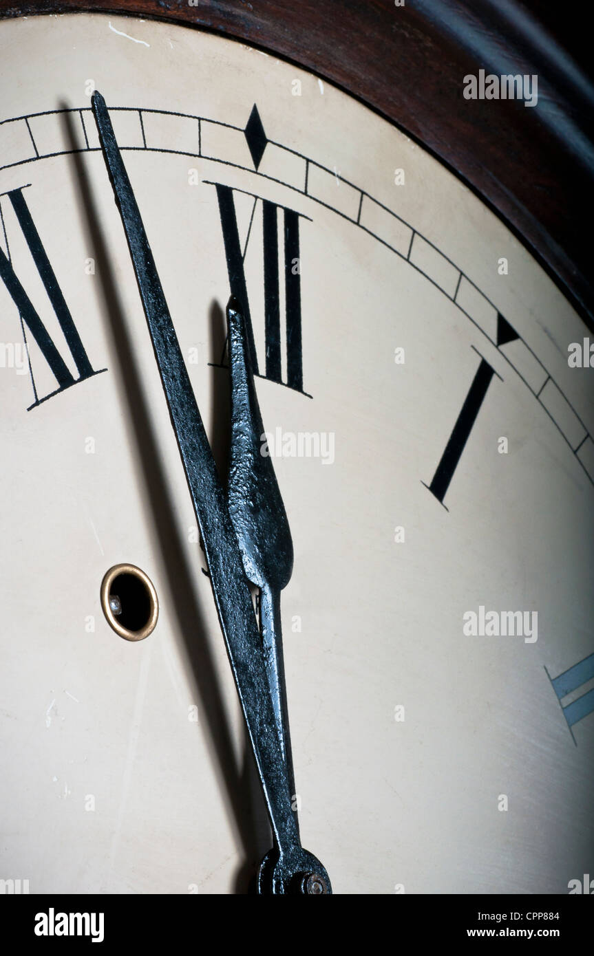 Old clock near to mid night Stock Photo Alamy