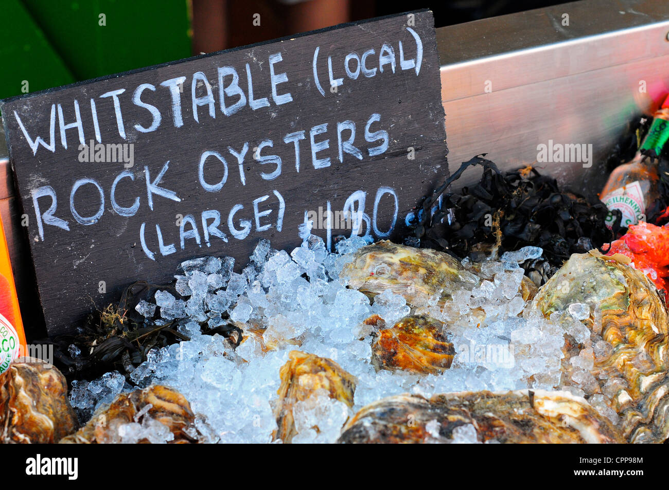 Sign for rock oysters, Whitstable, Kent Stock Photo