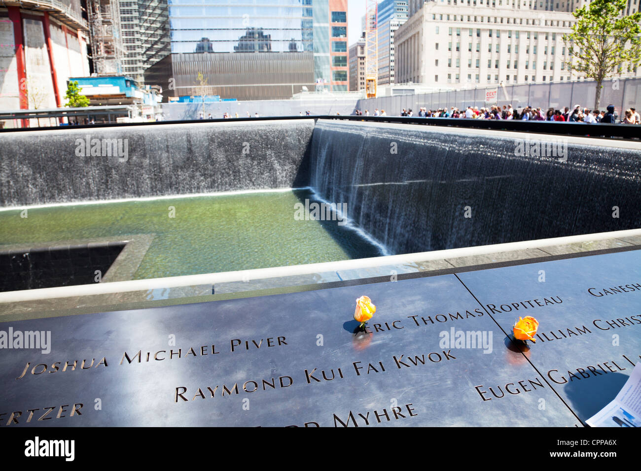 9/11 memorial at ground zero, waterfalls with names inscribed around ...