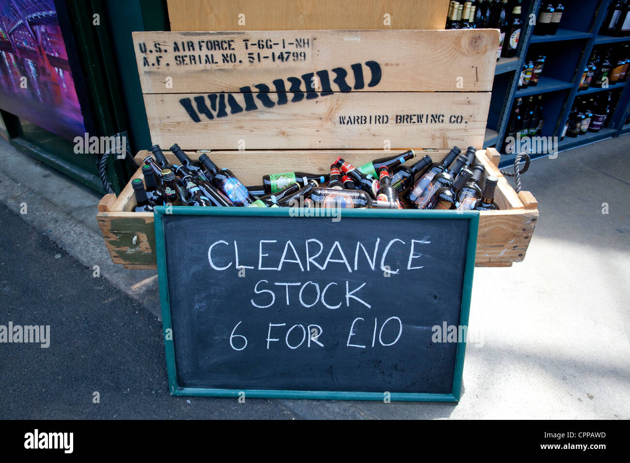 clearance stock sign on a Warbird box full of bottles of beer, Borough Market, London, England, UK Stock Photo