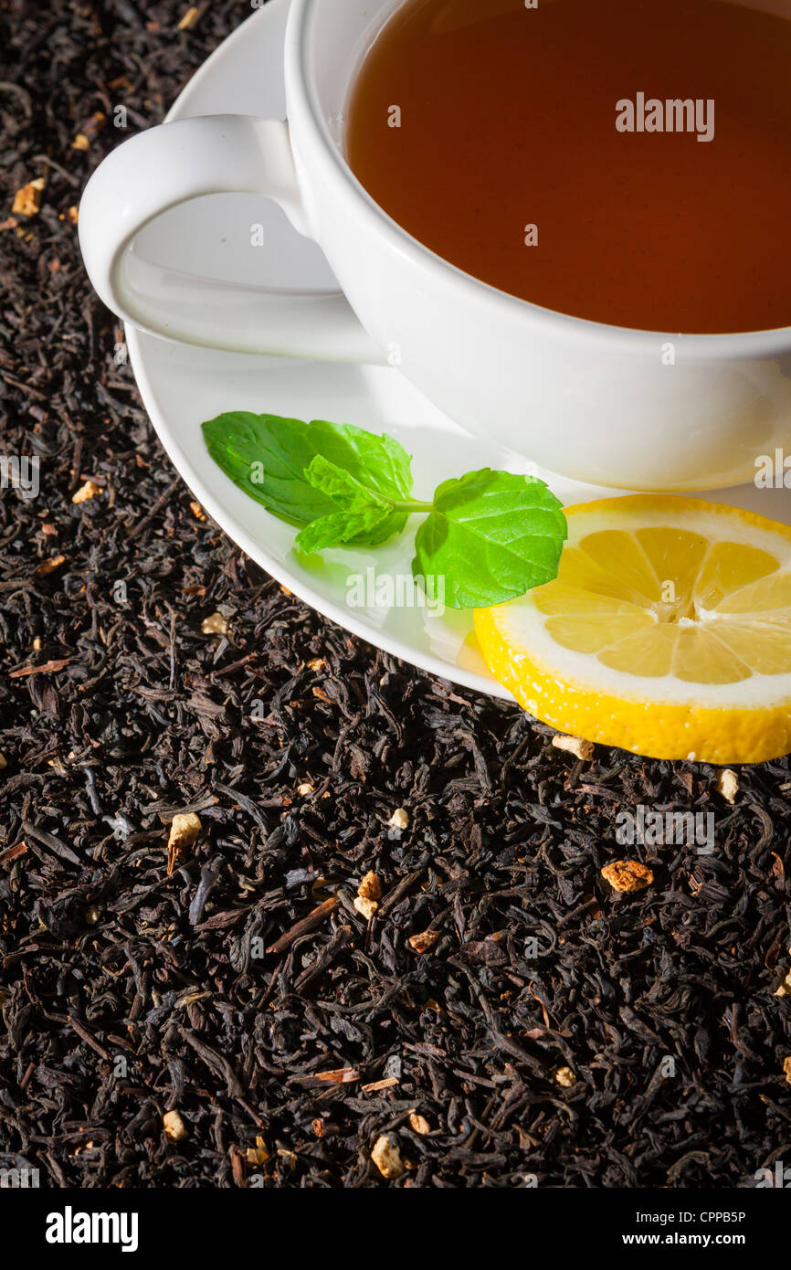 White cup of tea with mint leaf Stock Photo