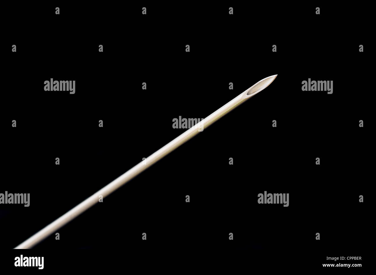 hypodermic needle point macro with black background Stock Photo