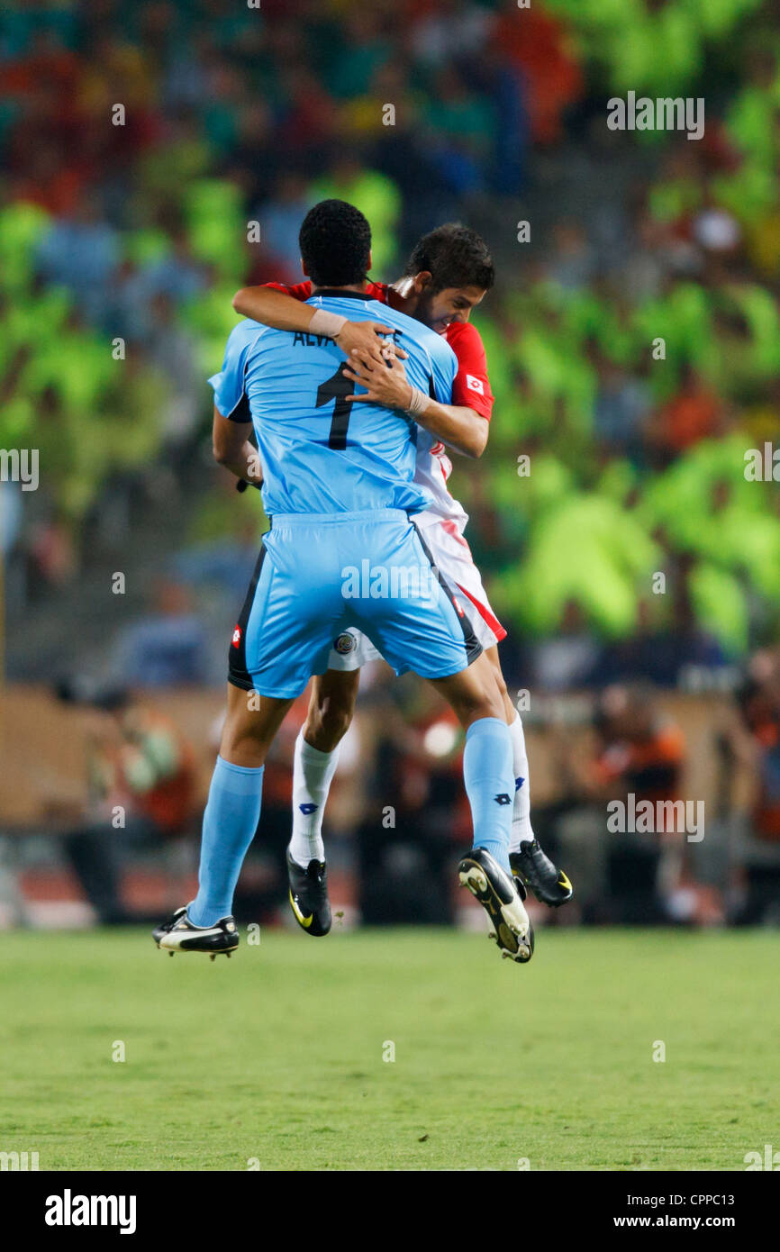Costa Rica goalkeeper Esteban Alvarado and teammate Cristian Gamboa celebrate after a goal against Egypt during a U20 WC match. Stock Photo