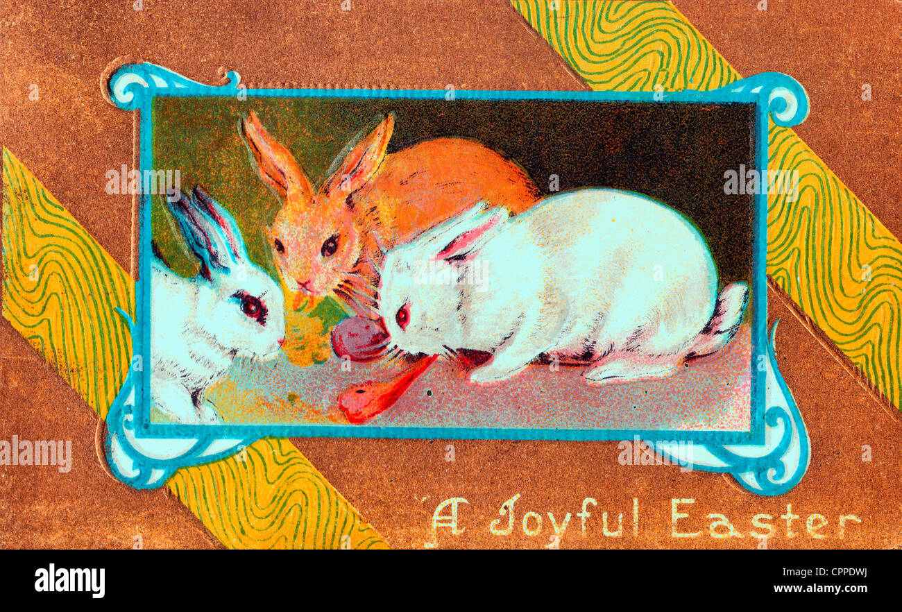 A Joyful Easter - vintage card showing rabbits eating Stock Photo