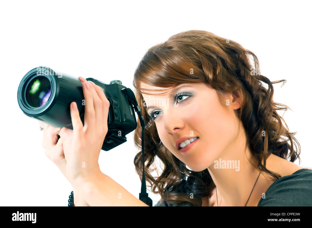 Beautiful young woman checking the lcd screen on the back of her ...