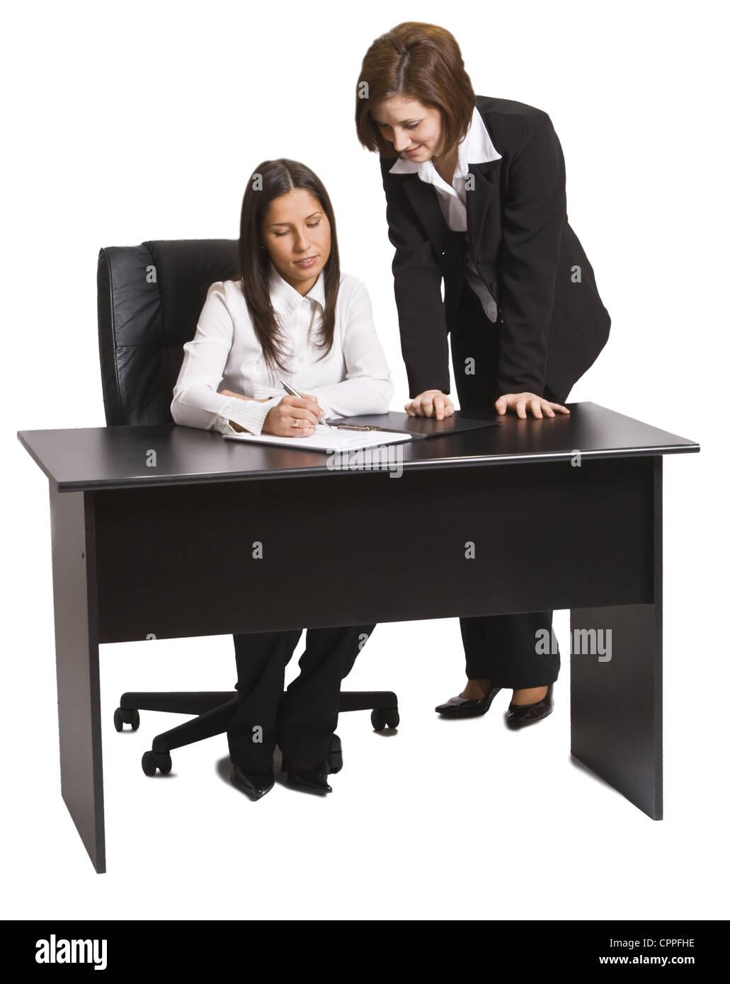Two businesswomen working together in an office Stock Photo - Alamy