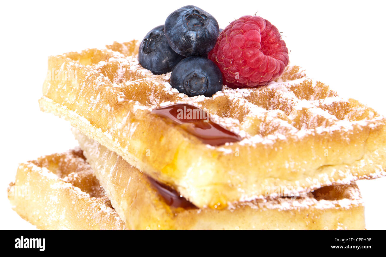 Heap of fresh waffles with sirup and fresh fruits (with clipping paths) Stock Photo