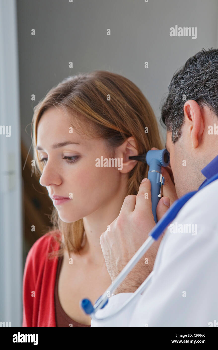 EAR NOSE & THROAT, WOMAN Stock Photo - Alamy