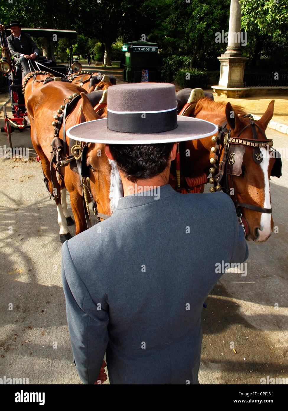 Spain Andalusia Seville Spaniard Spanish man wear cordobes Hat with his horsecart Stock Photo