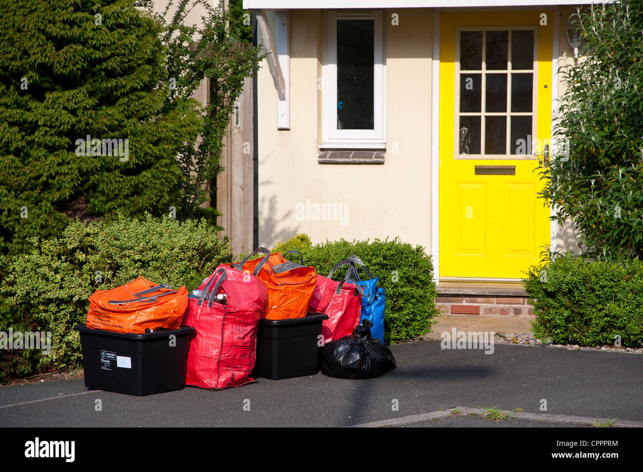 Household waste and recycling awaiting kerbside collection by Cornwall