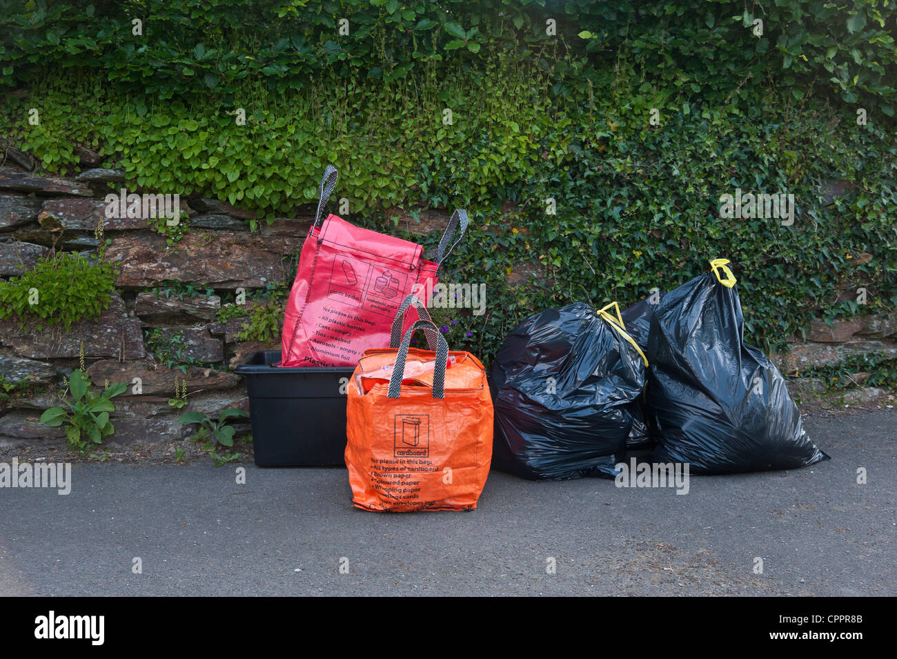 Household waste recycling awaiting kerbside hires stock photography